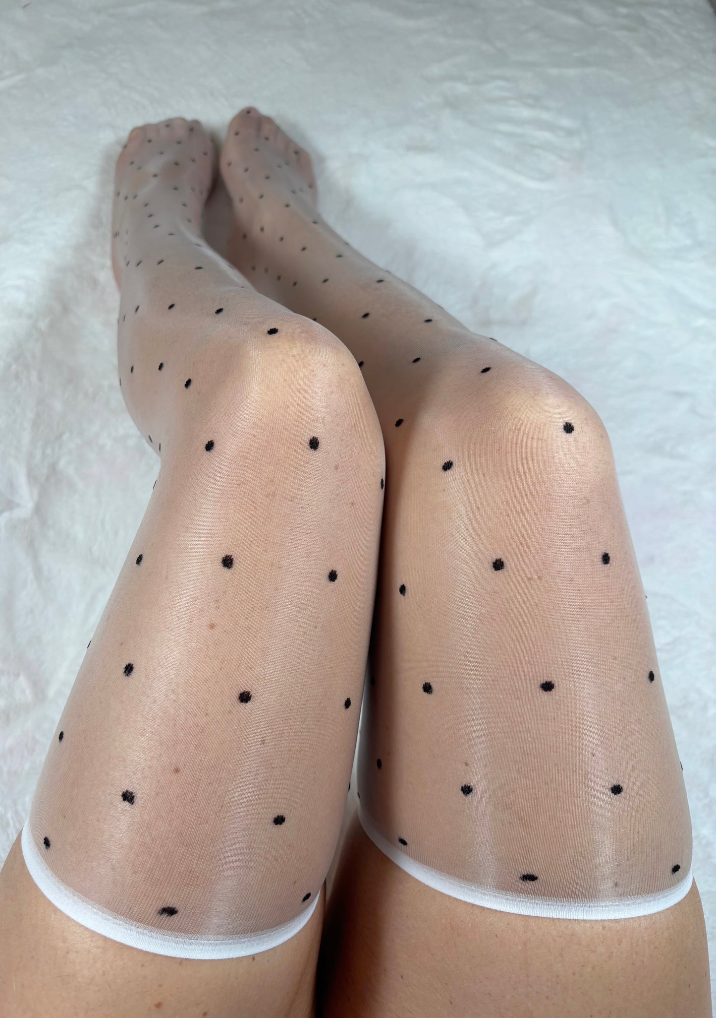 Polka dot white oil shine stockings.